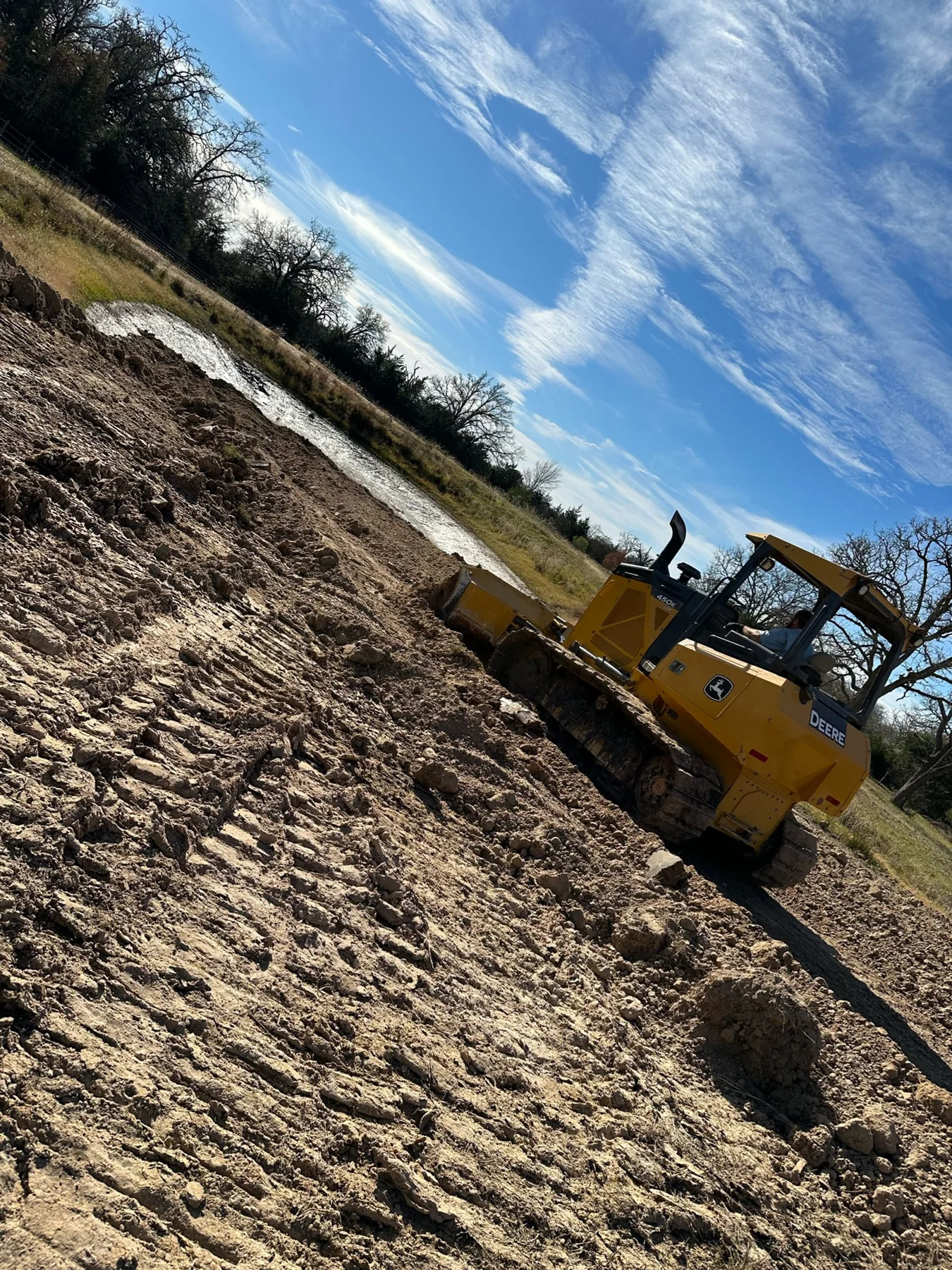 Double R dozer shaping a site